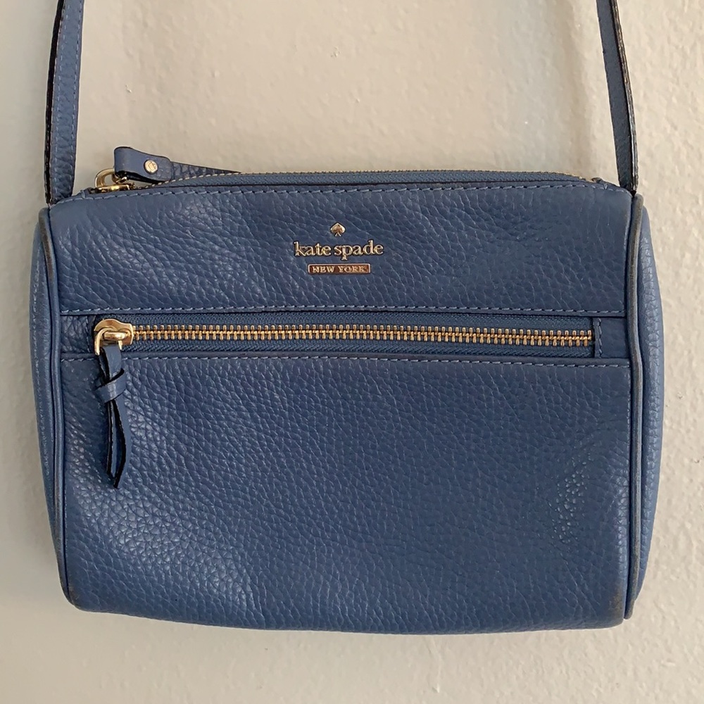 Kate Spade small crossbody bag, a beautiful blue color, used- in good condition.